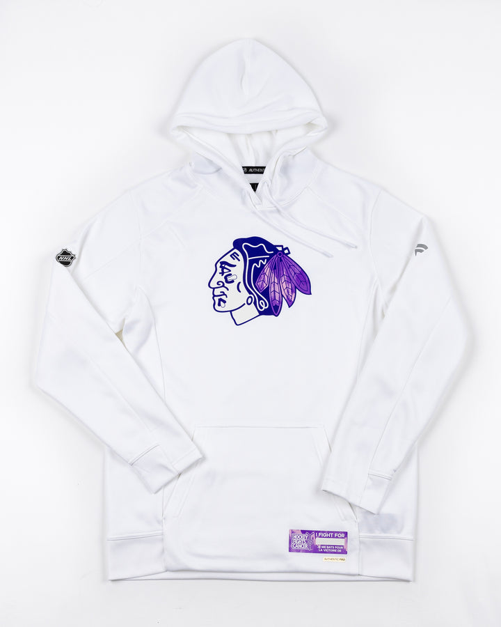 white Fanatics hoodie with purple tonal primary logo on front and Hockey Fights Cancer personalization tag on left hem - front lay flat