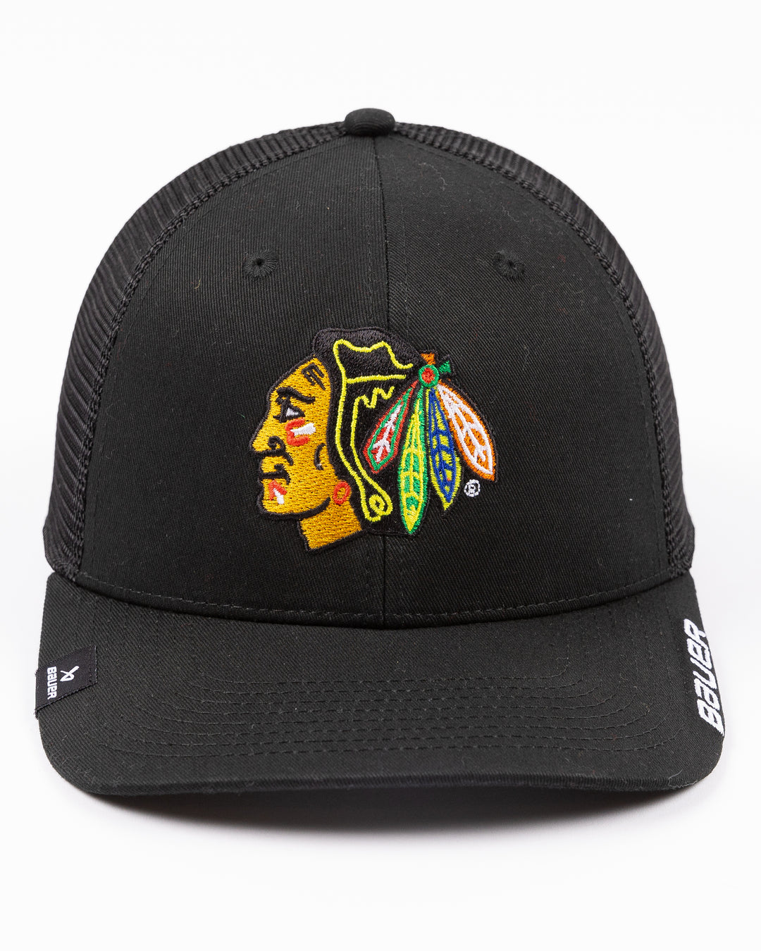 black Bauer adjustable mesh snapback trucker hat with Chicago Blackhawks primary logo embroidered on front - front lay flat