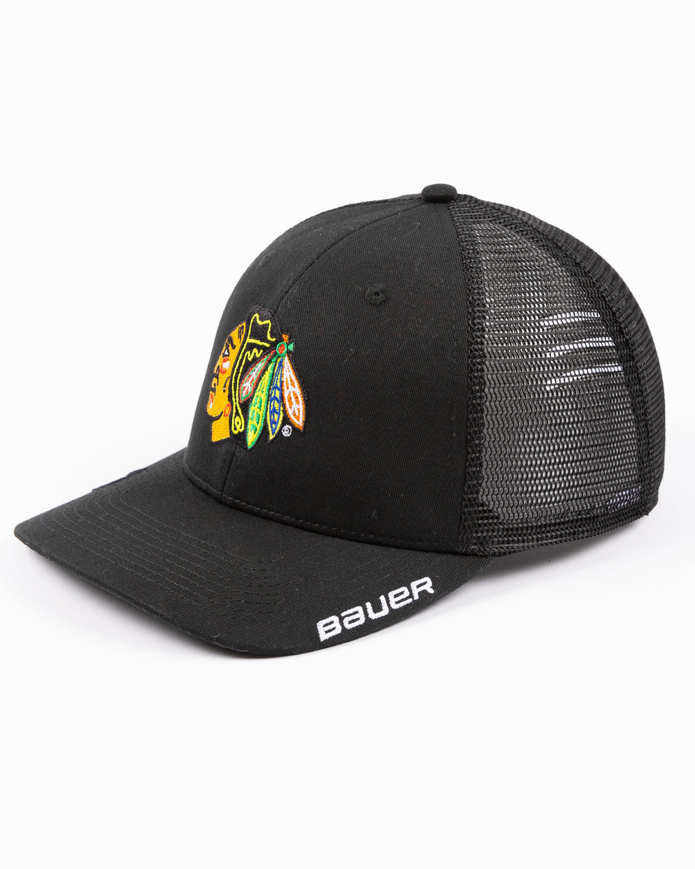 black Bauer adjustable mesh snapback trucker hat with Chicago Blackhawks primary logo embroidered on front - left angle lay flat