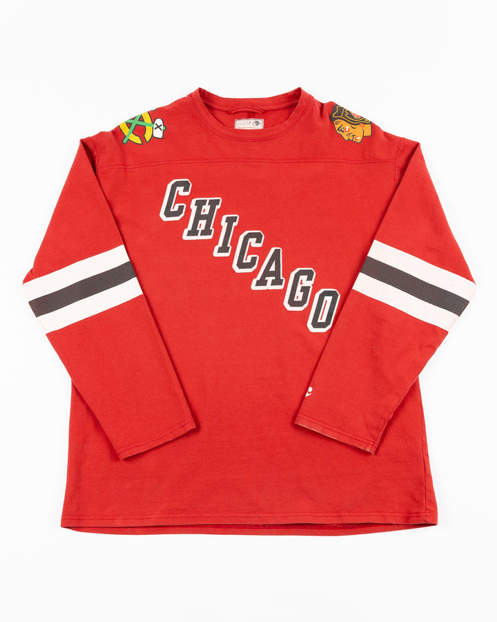 red Alice & Wonder long sleeve tee with diagonal Chicago wordmark and Chicago Blackhawks secondary and primary logo on shoulders and jersey-inspired stripes on sleeves - front lay flat