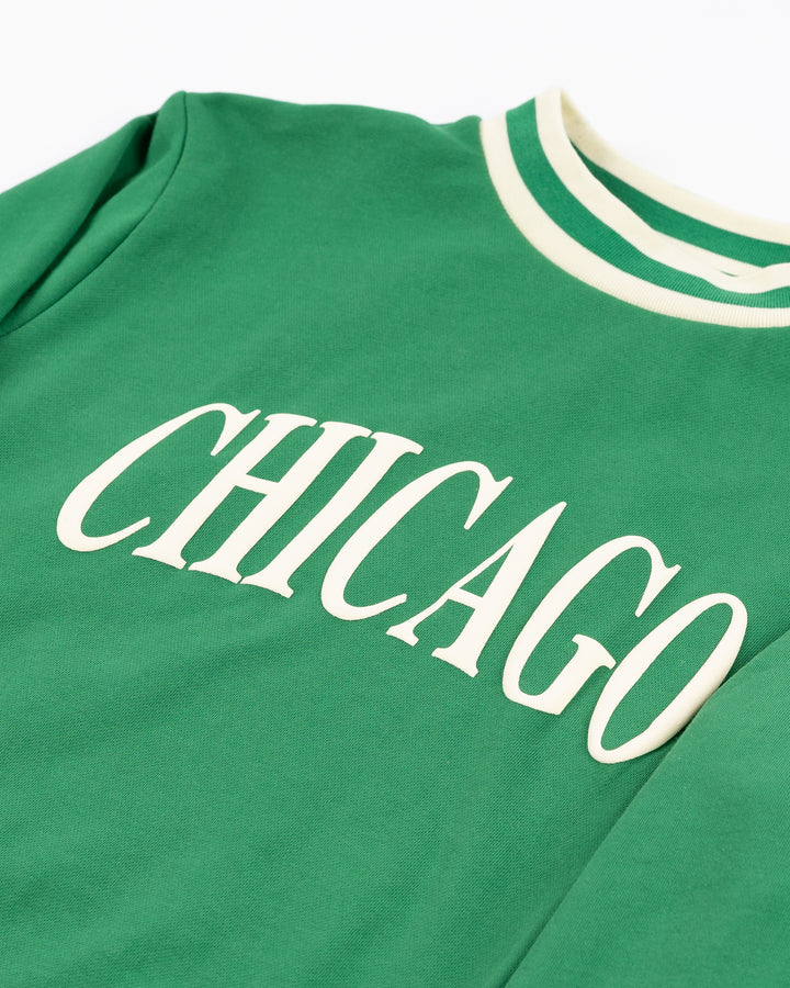 green Alice & Wonder crewneck sweater with Chicago wordmark graphic and tonal Chicago Blackhawks primary logo on left shoulder - front detail lay flat