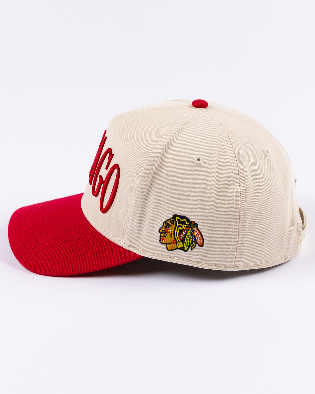 cream and red Alice & Wonder hat with Chicago wordmark on front and Chicago Blackhawks primary logo on left side - left side lay flat