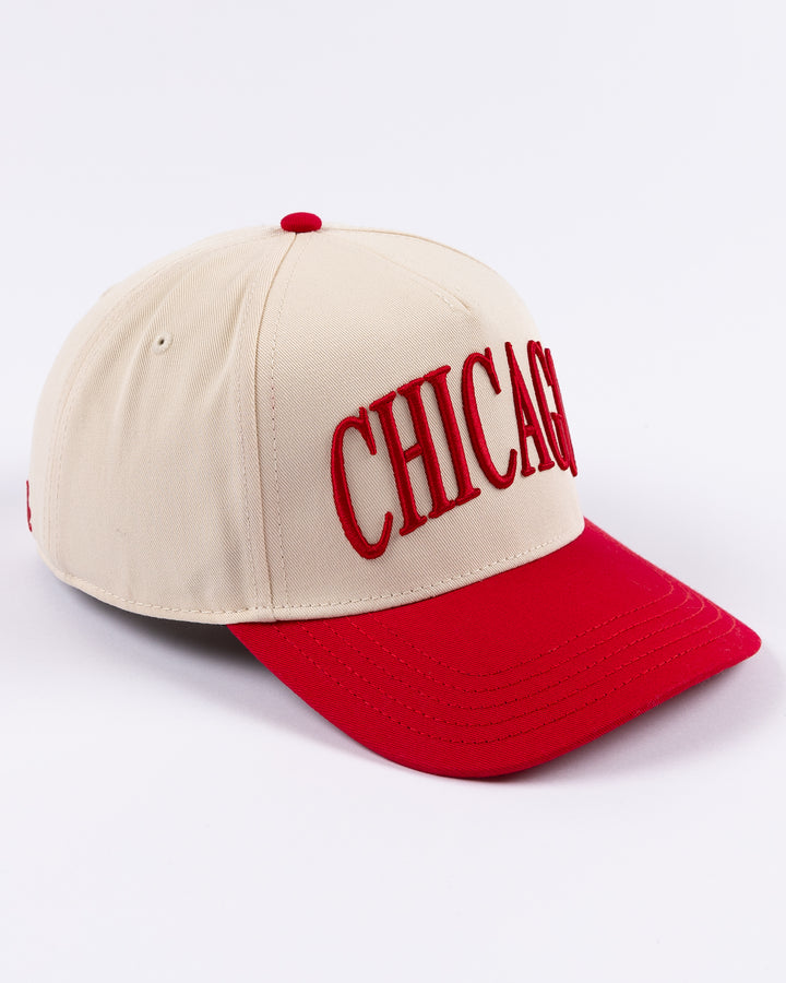 cream and red Alice & Wonder hat with Chicago wordmark on front and Chicago Blackhawks primary logo on left side - right angle lay flat