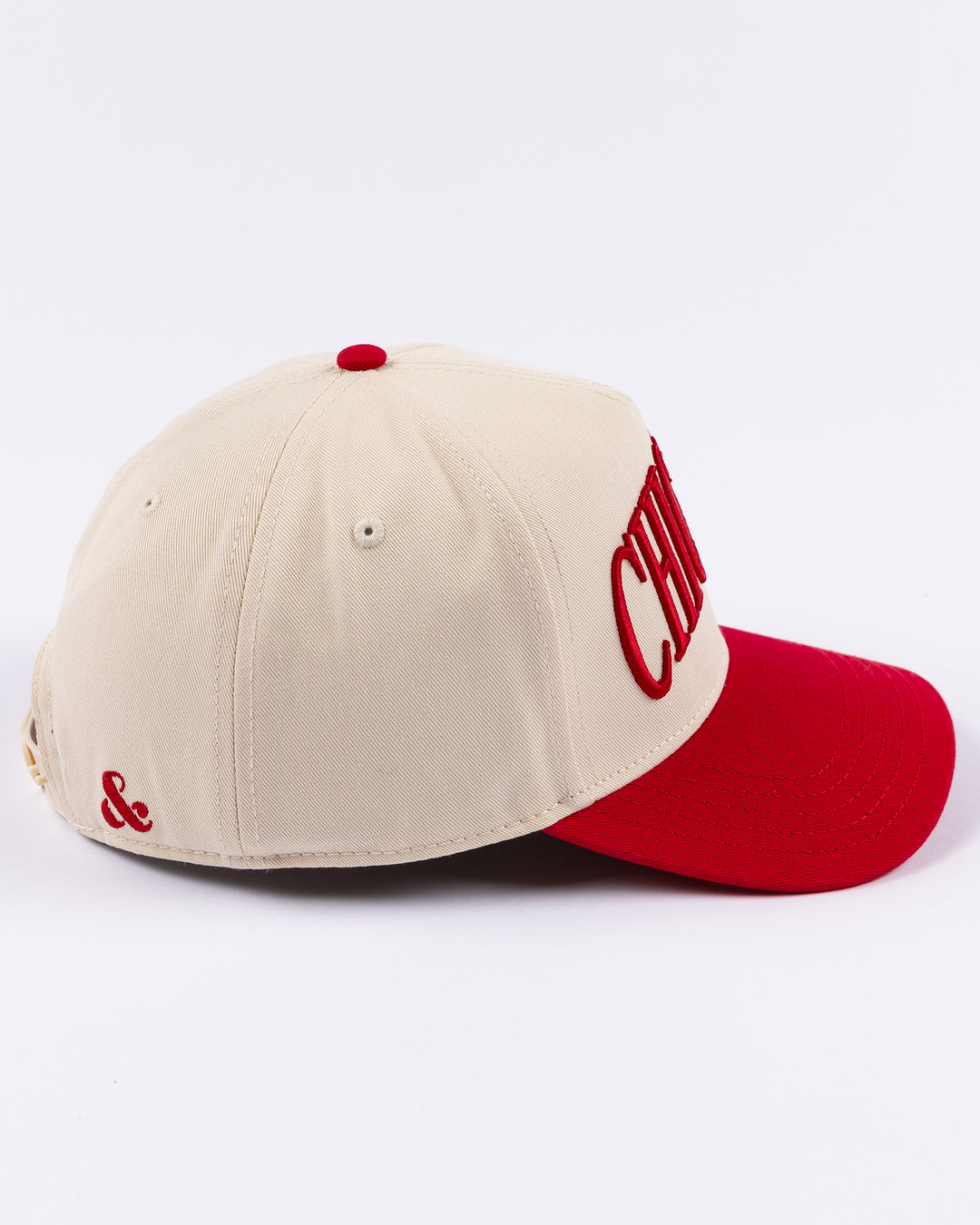 cream and red Alice & Wonder hat with Chicago wordmark on front and Chicago Blackhawks primary logo on left side - right side lay flat