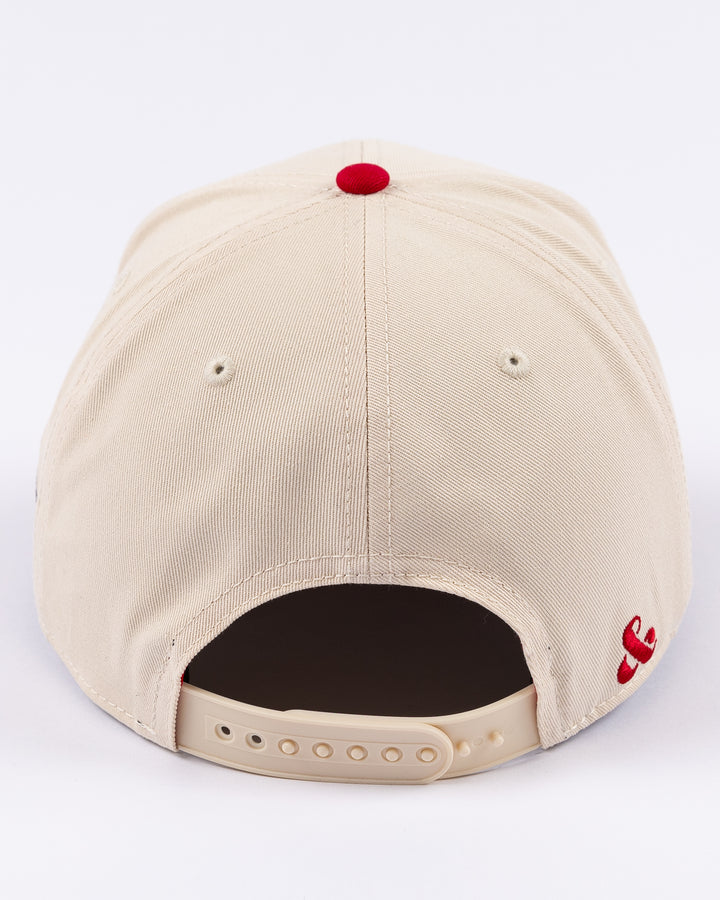 cream and red Alice & Wonder hat with Chicago wordmark on front and Chicago Blackhawks primary logo on left side - back lay flat