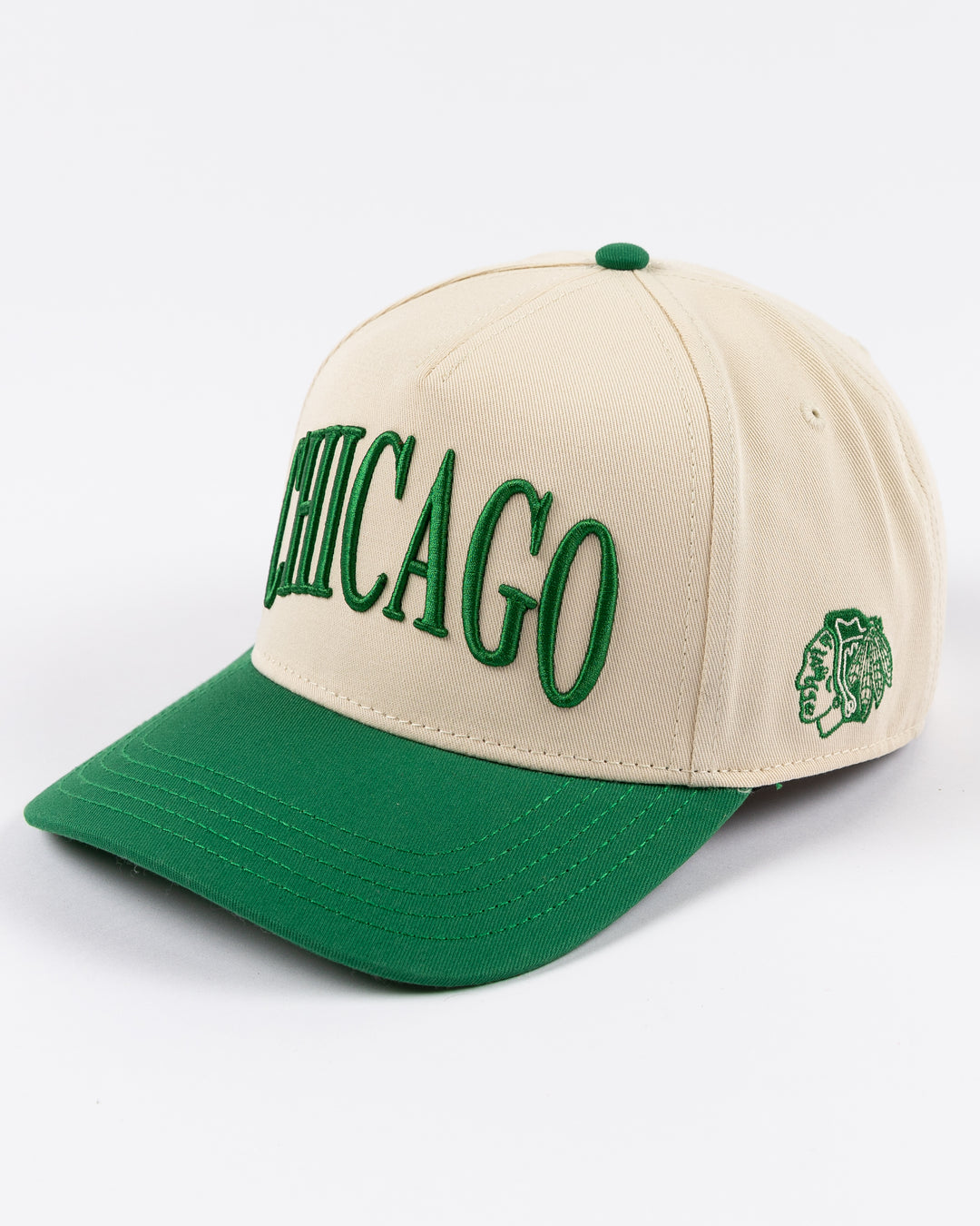 cream and green Alice & Wonder hat with Chicago wordmark on front and Chicago Blackhawks primary logo on left side - left angle lay flat