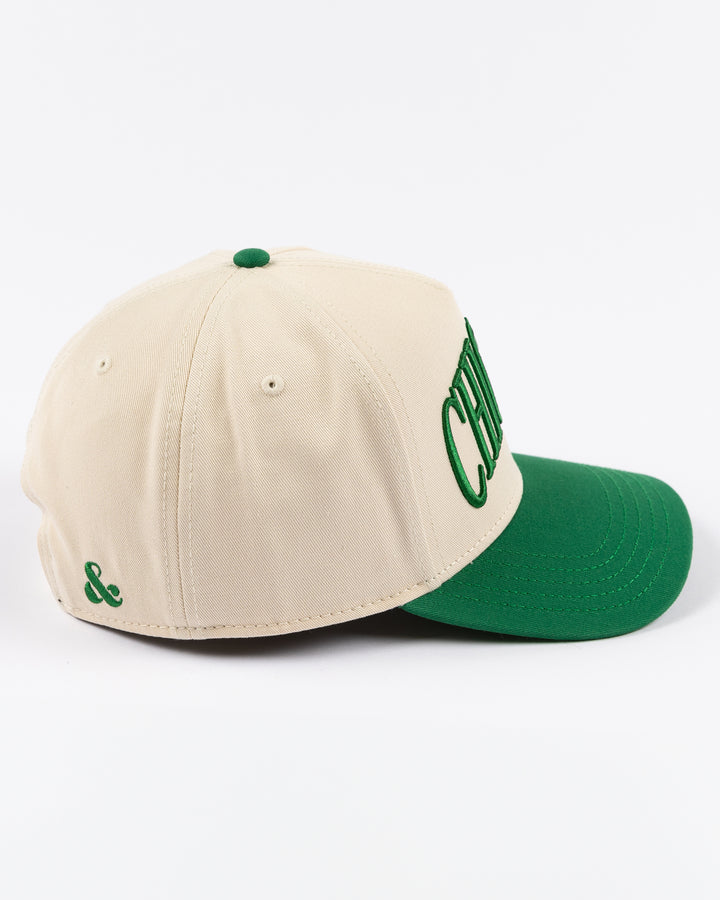 cream and green Alice & Wonder hat with Chicago wordmark on front and Chicago Blackhawks primary logo on left side - right side lay flat