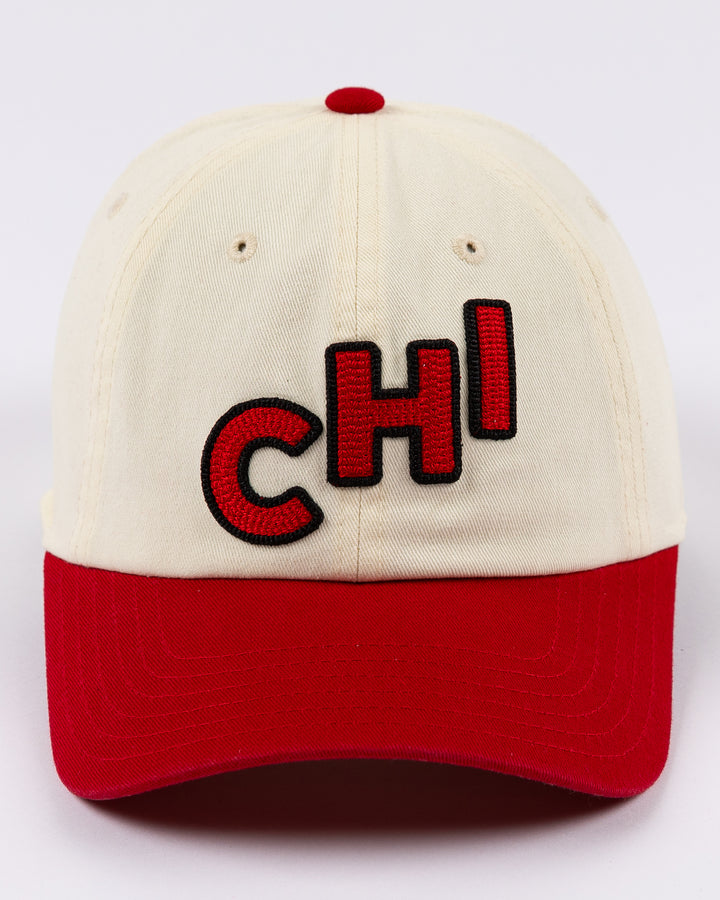 two tone red and white Alice & Wonder baseball hat with embroidered CHI detailing on front and Blackhawks wordmark on back - front lay flat