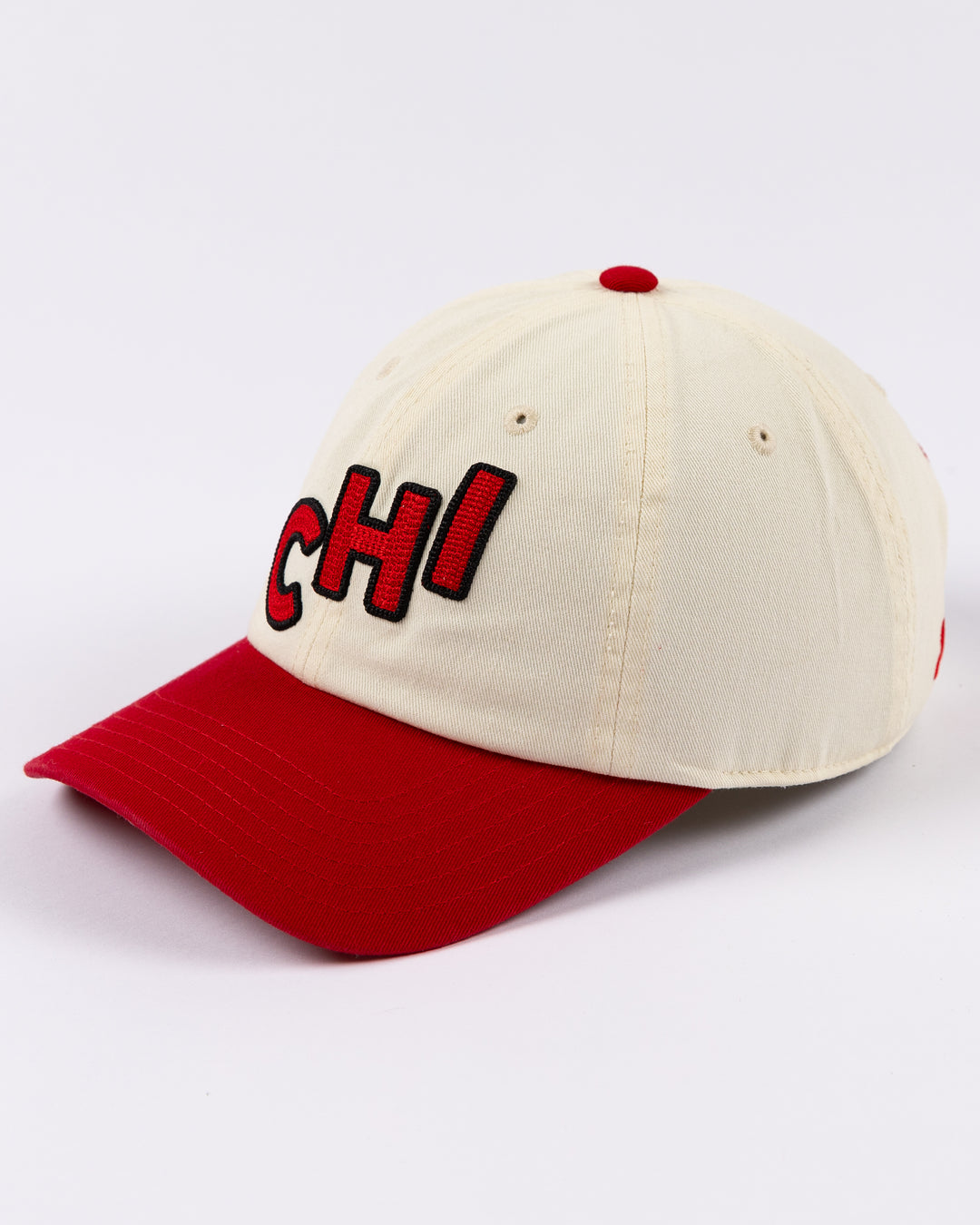 two tone red and white Alice & Wonder baseball hat with embroidered CHI detailing on front and Blackhawks wordmark on back - left side lay flat