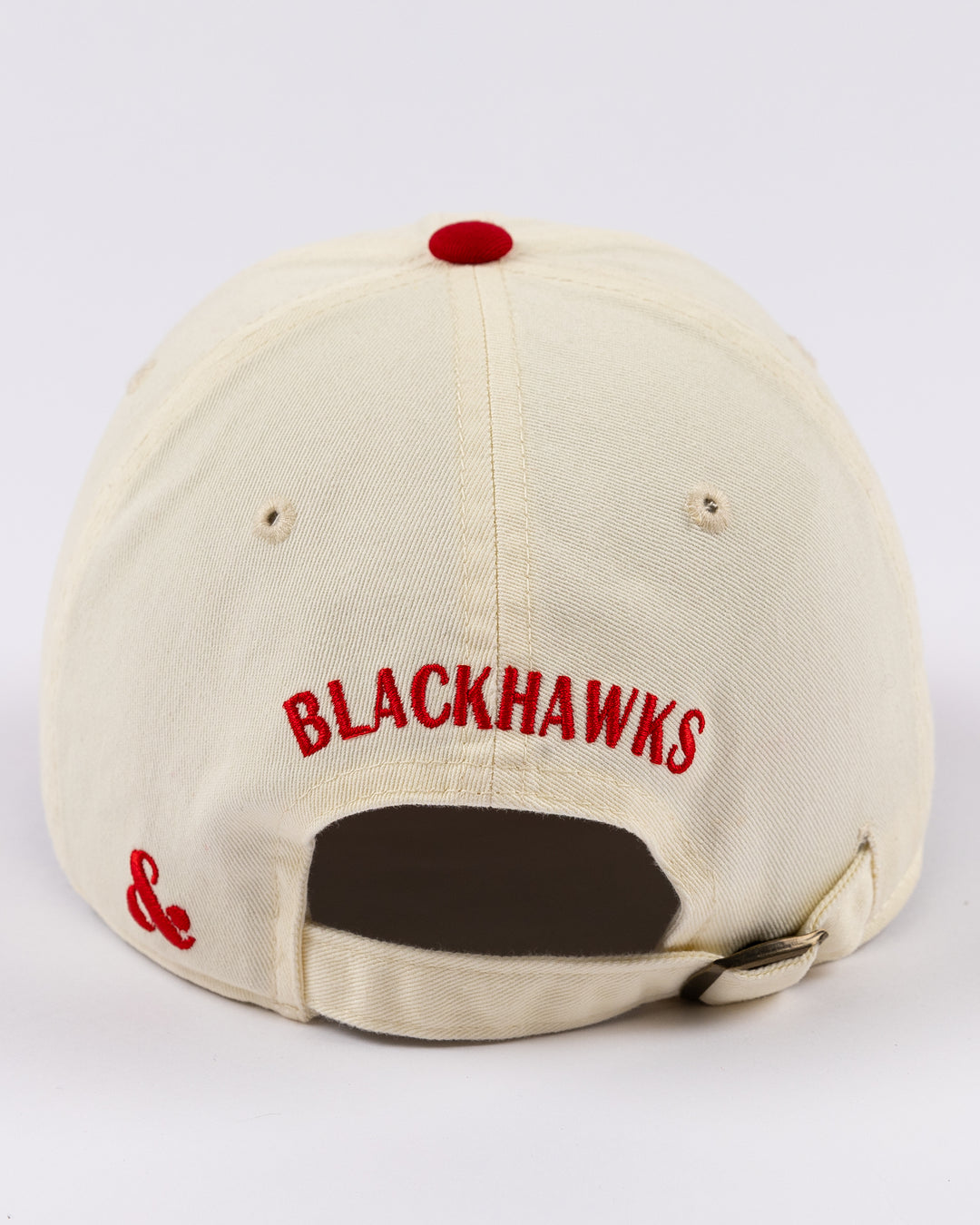 two tone red and white Alice & Wonder baseball hat with embroidered CHI detailing on front and Blackhawks wordmark on back - back lay flat