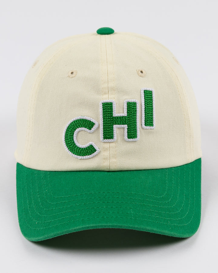 cream and green Alice & Wonder hat with CHI chain stitched on front with Blackhawks wordmark on back - front lay flat