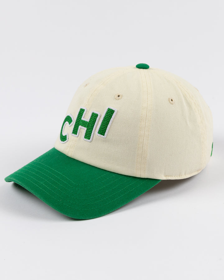 cream and green Alice & Wonder hat with CHI chain stitched on front with Blackhawks wordmark on back - left angle lay flat