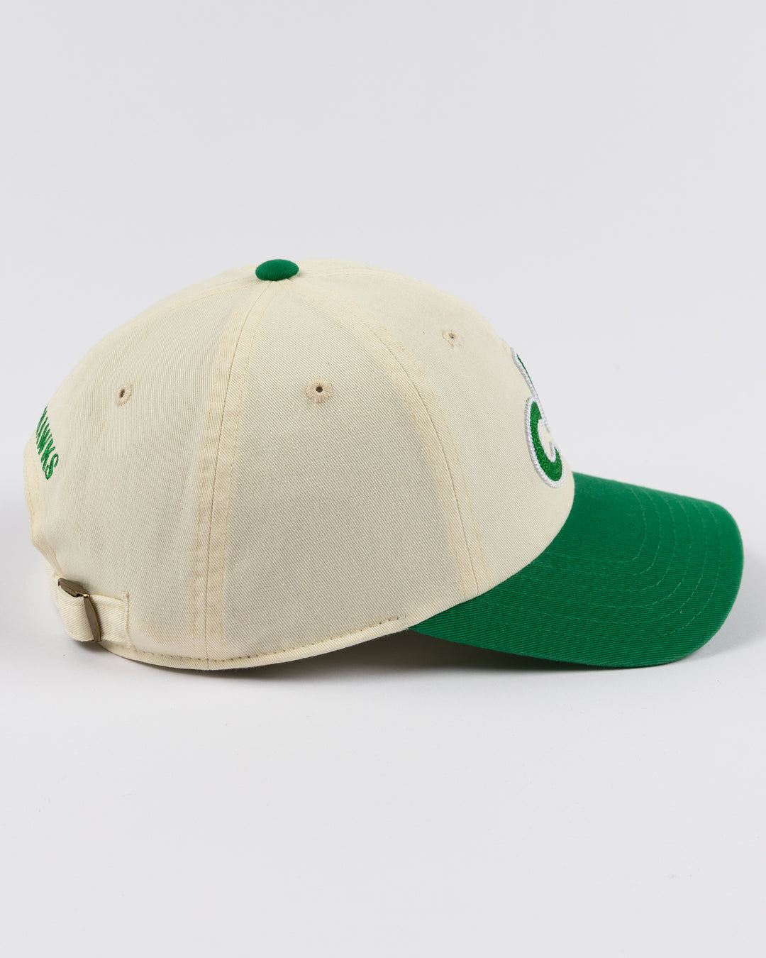 cream and green Alice & Wonder hat with CHI chain stitched on front with Blackhawks wordmark on back - right side lay flat