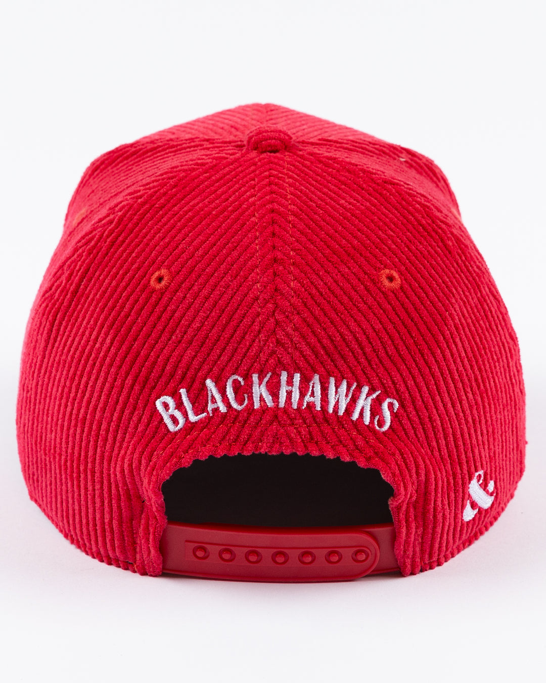 red corduroy Alice & Wonder adjustable hat with white chainstitched Chicago script graphic on front and Chicago Blackhawks primary logo on left side - back lay flat