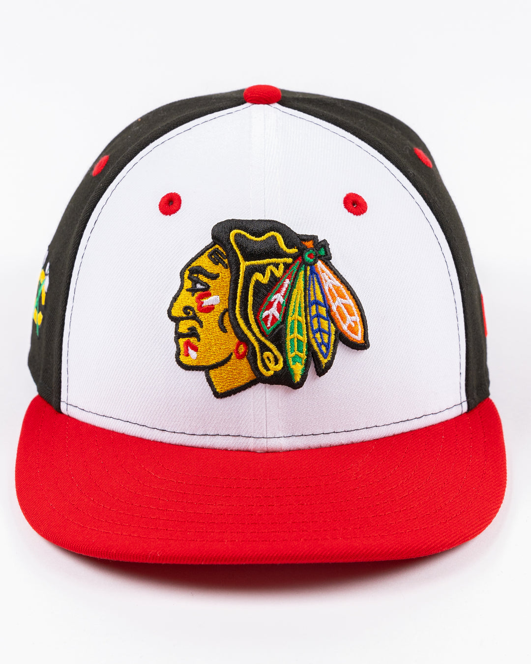 New Era 59FIFTY black white and red fitted hat with embroidered primary logo on front and secondary logo embroidered on right side and Chicago stars on back - front lay flat