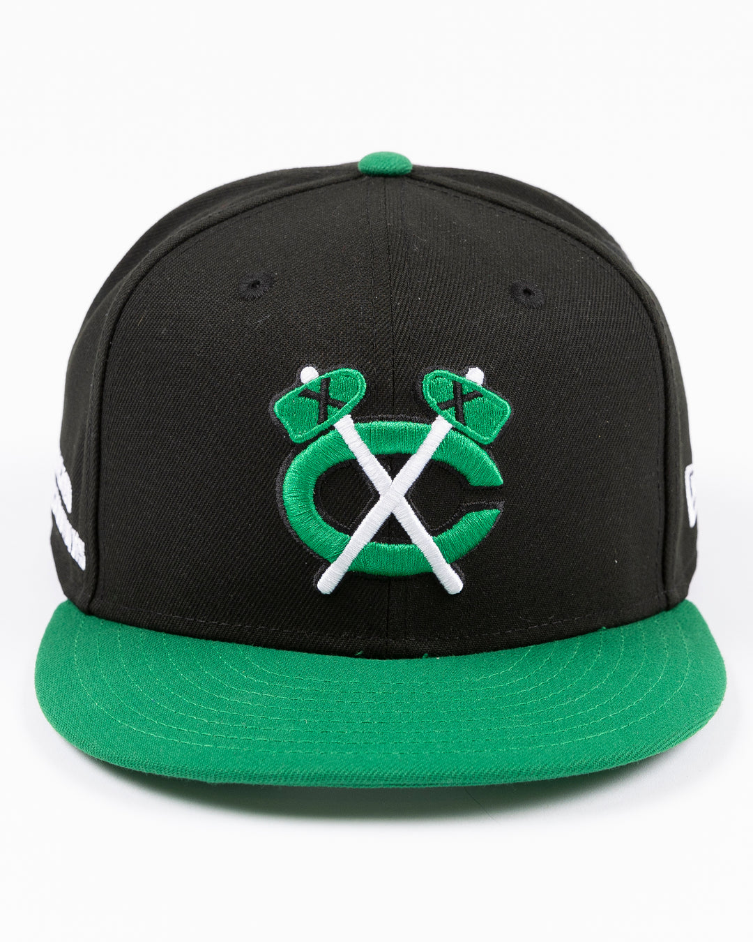 black and green two tone New Era 9FIFTY snapback with tonal Chicago Blackhawks secondary logo embroidered on front - front lay flat