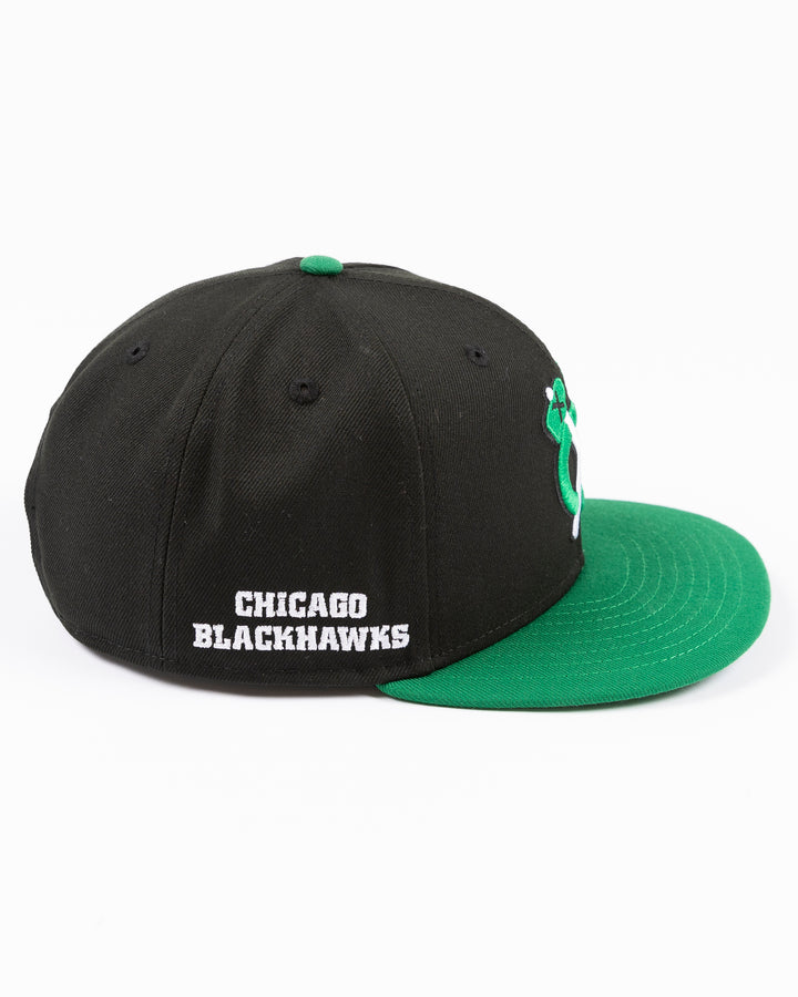 black and green two tone New Era 9FIFTY snapback with tonal Chicago Blackhawks secondary logo embroidered on front - right side lay flat