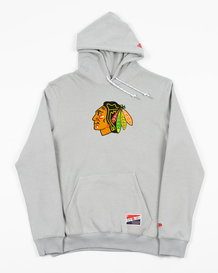 soft grey New Era hoodie with Chicago Blackhawks primary logo on front chest - front lay flat