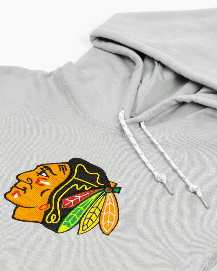 soft grey New Era hoodie with Chicago Blackhawks primary logo on front chest - front detail lay flat