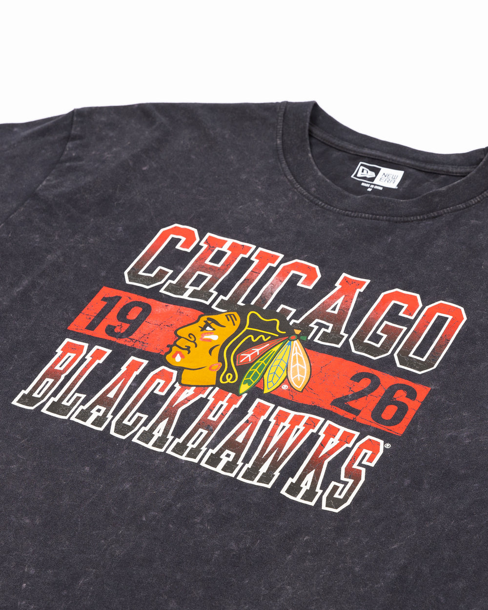 washed black short sleeve New Era tee with Chicago Blackhawks 1926 graphic with primary logo across front - front detail lay flat