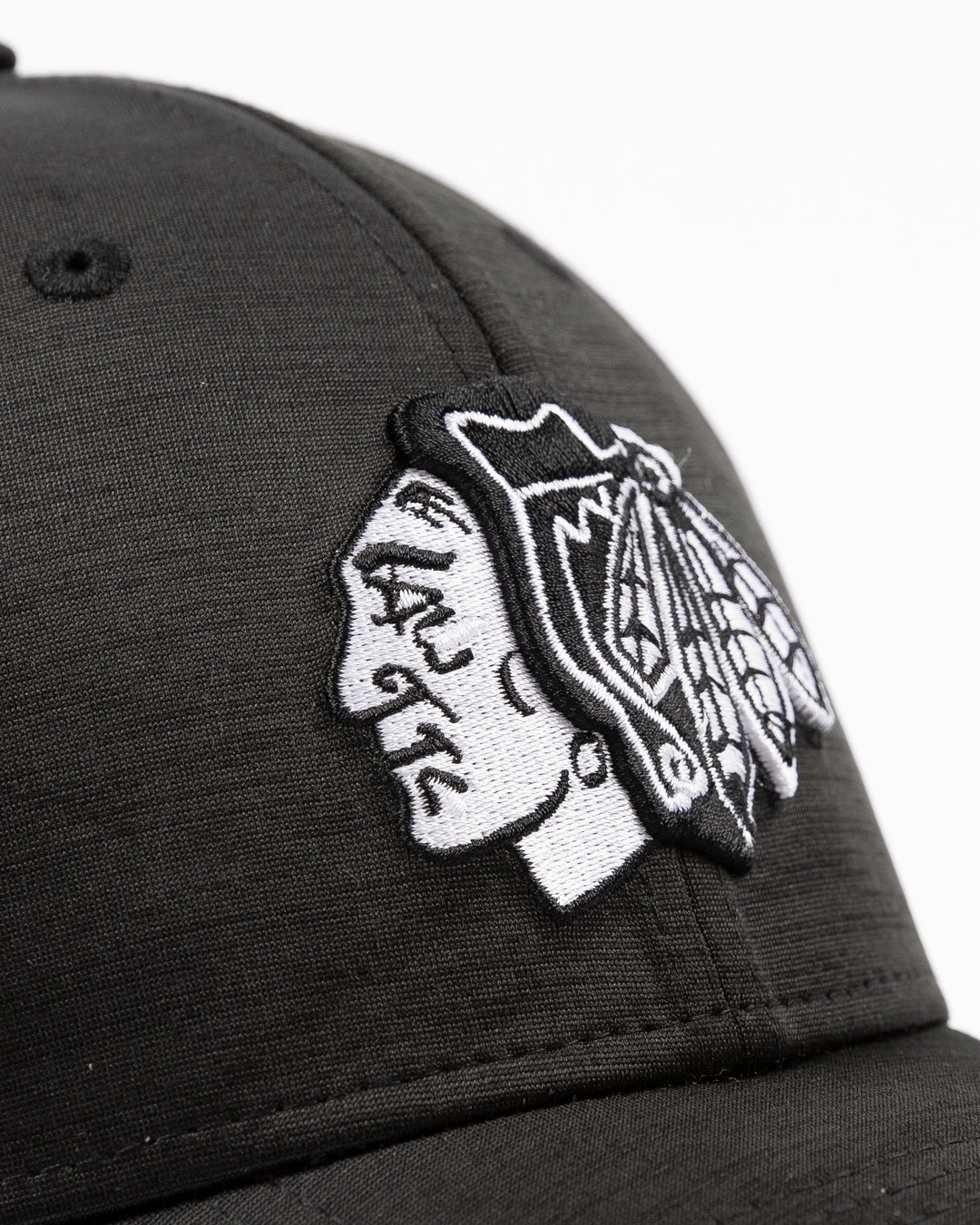 black New Era fitted hat with tonal embroidered Chicago Blackhawks primary logo on front - front detail lay flat