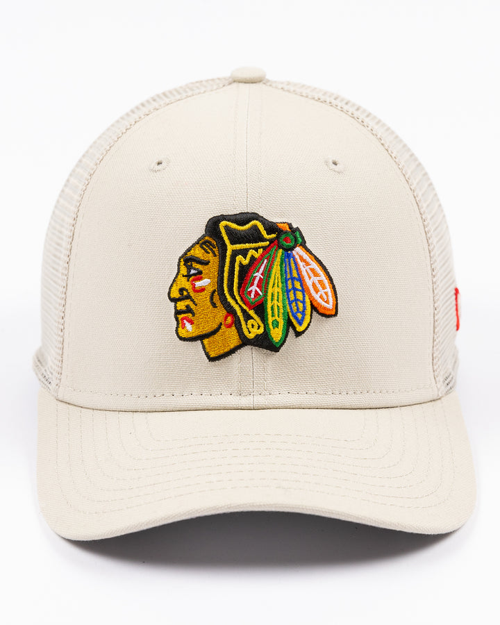 beige New Era adjustable snapback cap with Chicago Blackhawks primary logo embroidered on front - front lay flat