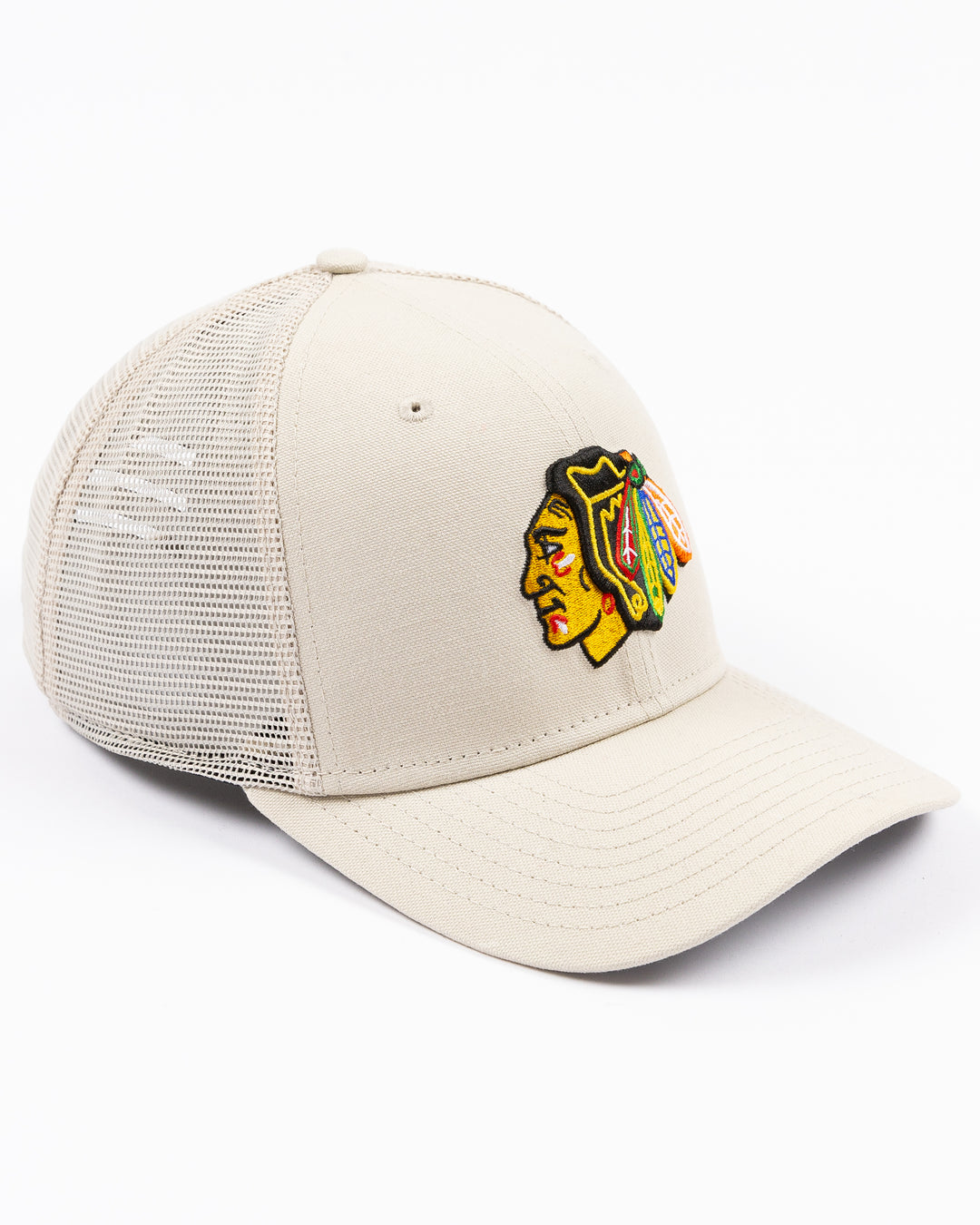 beige New Era adjustable snapback cap with Chicago Blackhawks primary logo embroidered on front - right angle lay flat