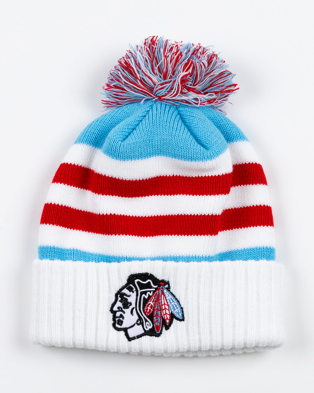 red, white and blue striped knit hat with Chicago Blackhawks primary logo embroidered on front cuff and multi-color pom on top - front lay flat