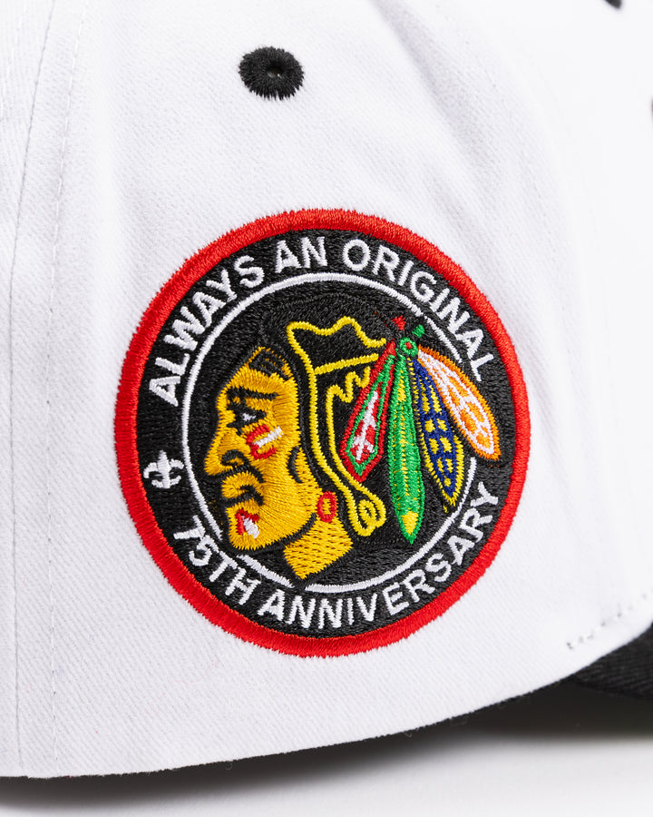 black and white Mitchell & Ness adjustable cap with embroidered Chicago Blackhawks hockey wordmark on front and primary logo on right side - detail lay flat