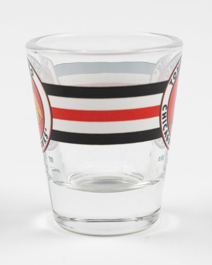 shot glass with Chicago Blackhawks mascot Tommy on classic stripe design - side lay flat