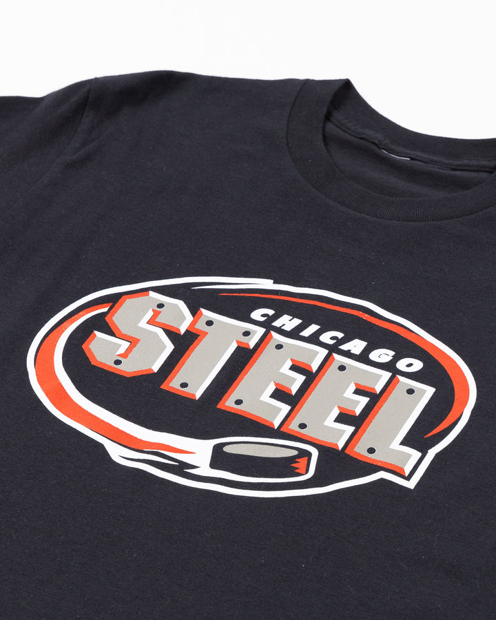 youth black short sleeve tee with Chicago Steel logo on front - front detail lay flat