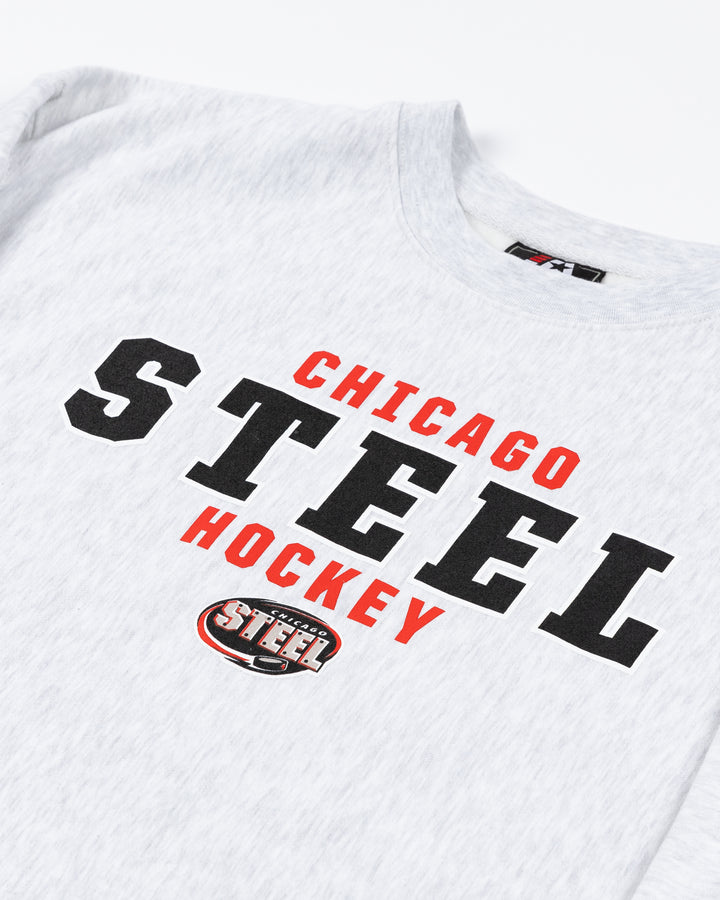 light grey reverse weave crewneck sweatshirt with Chicago Steel hockey wordmark and logo on front - front detail lay flat