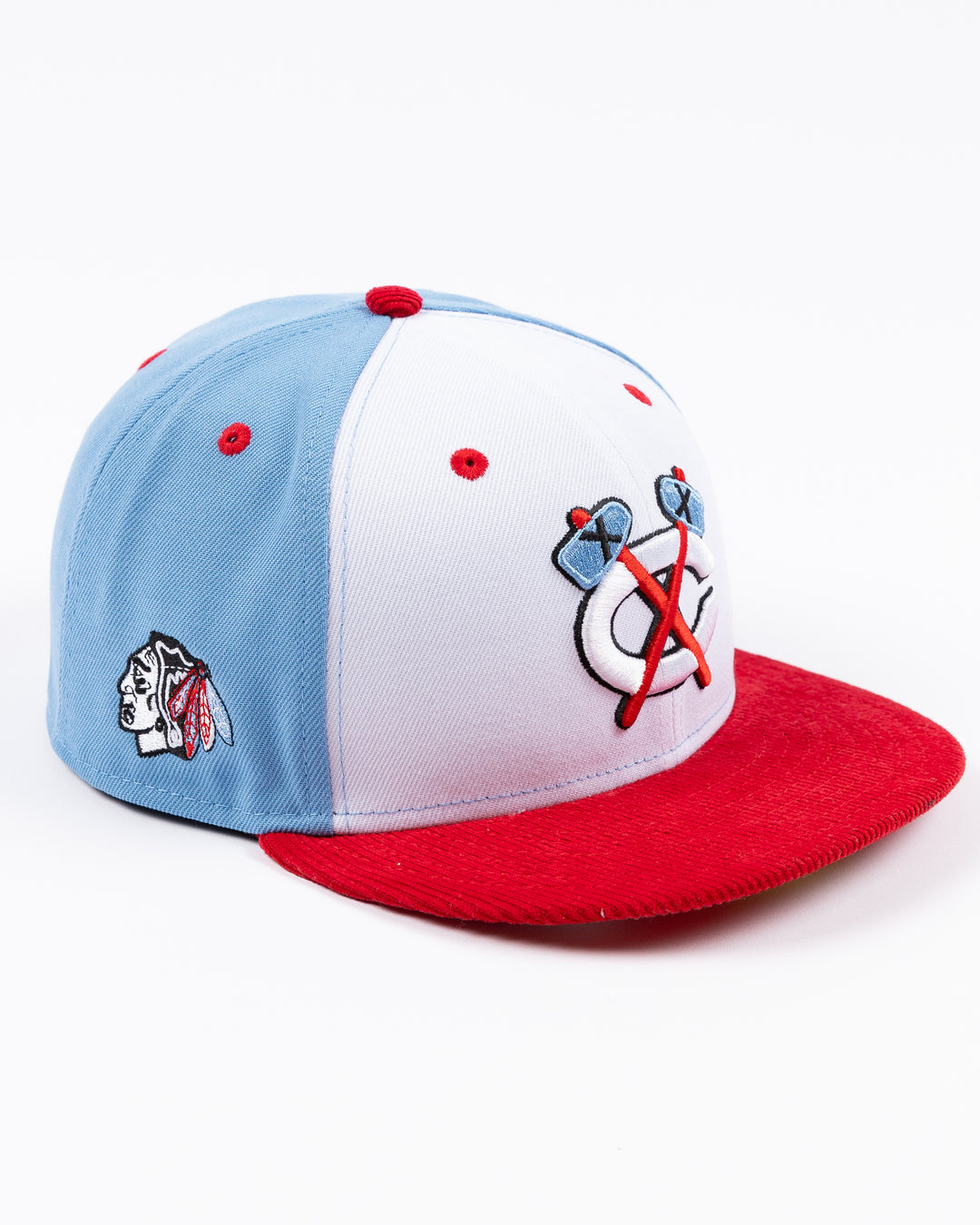 white blue and red New Era fitted 59FIFTY cap with Chicago Blackhawks secondary logo embroidered on front - right angle lay flat