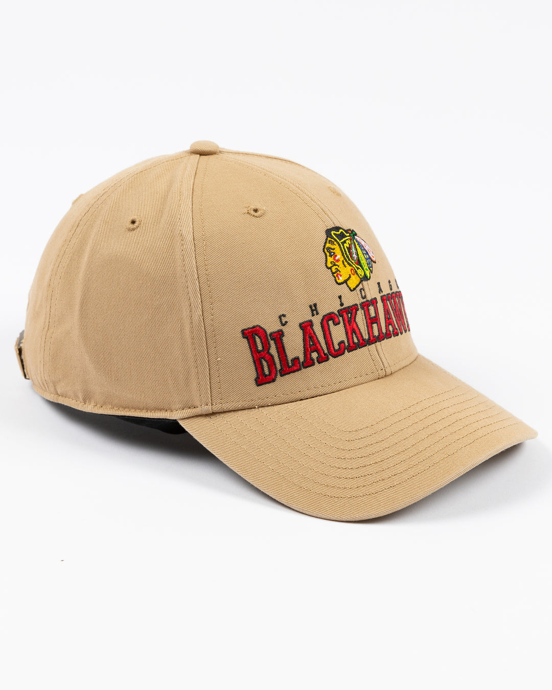 khaki '47 brand adjustable cap with Chicago Blackhawks wordmark and primary logo embroidered on front - right angle lay flat