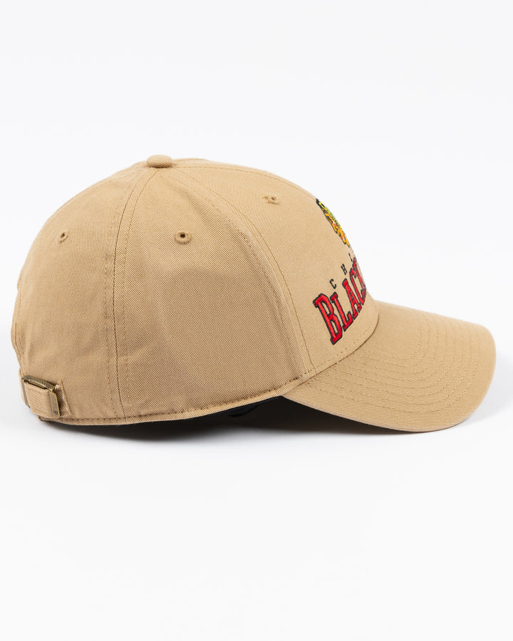 khaki '47 brand adjustable cap with Chicago Blackhawks wordmark and primary logo embroidered on front - right side lay flat