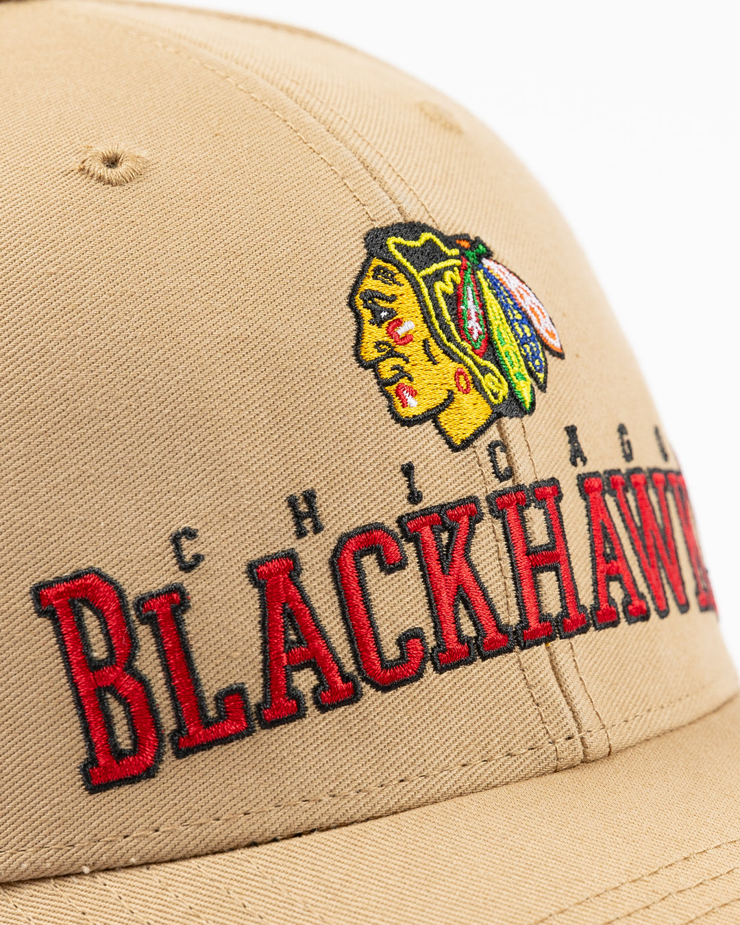 khaki '47 brand adjustable cap with Chicago Blackhawks wordmark and primary logo embroidered on front - front detail lay flat