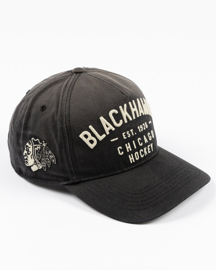 gradient black '47 brand adjustable hat with Chicago Blackhawks wordmark graphic embroidered on front and tonal primary logo embroidered on right side - right angle lay flat