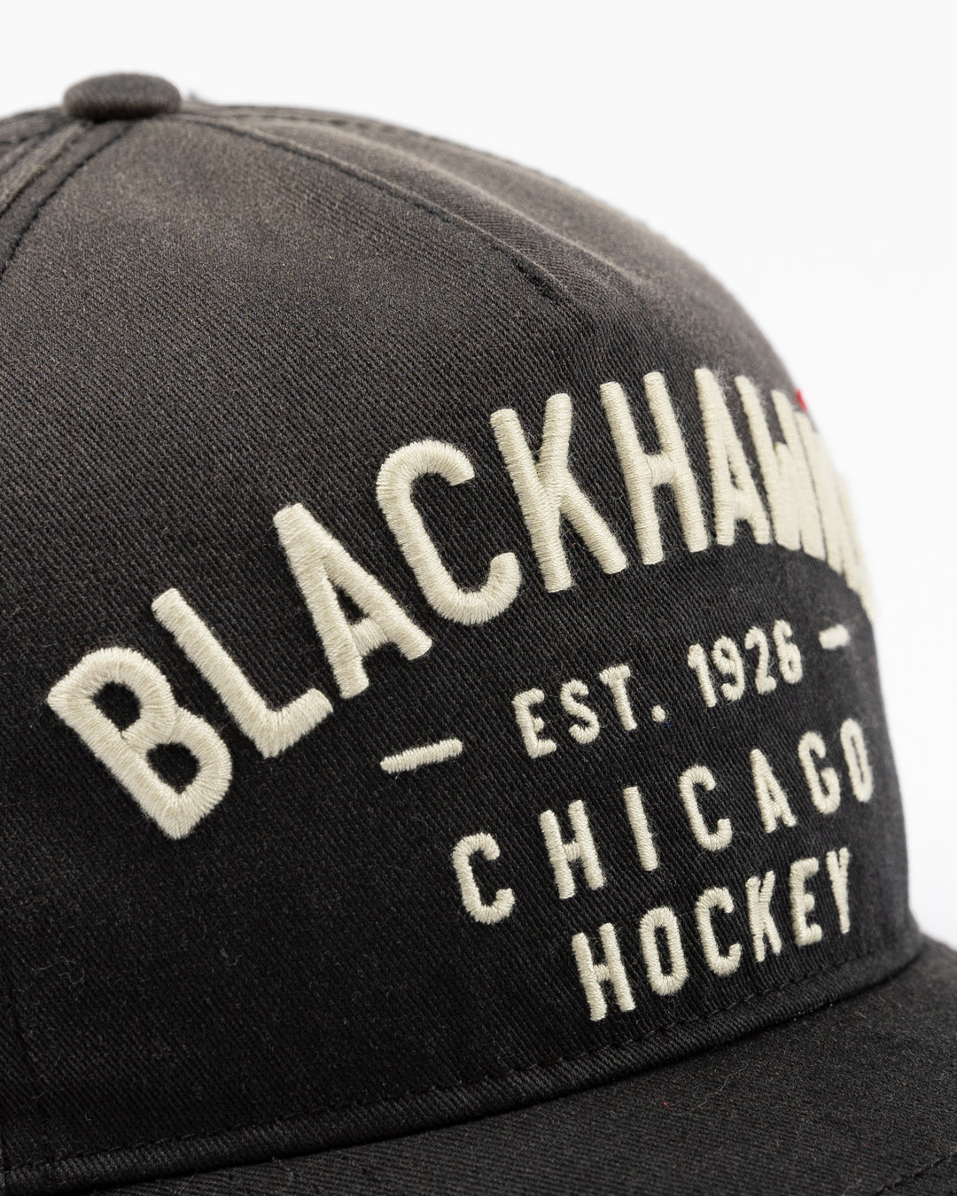 gradient black '47 brand adjustable hat with Chicago Blackhawks wordmark graphic embroidered on front and tonal primary logo embroidered on right side - front detail lay flat