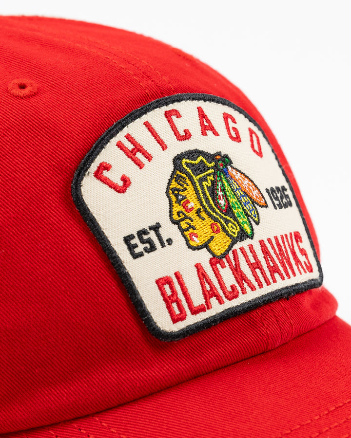 red and white '7 brand adjustable trucker with Chicago Blackhawks patch embroidered on front - front detail lay flat