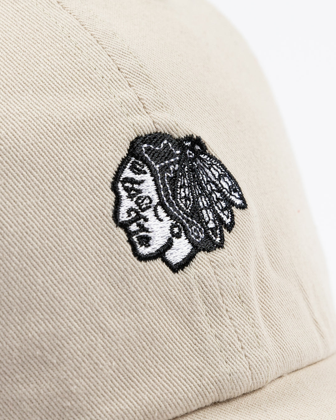 cream '47 brand clean up cap with mini tonal Chicago Blackhawks primary logo embroidered on front - front detail lay flat