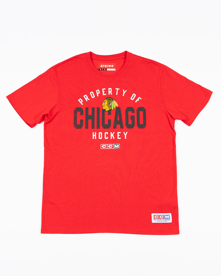 red CCM short sleeve tee with property of Chicago hockey wordmark and Chicago Blackhawks primary logo on front - front lay flat