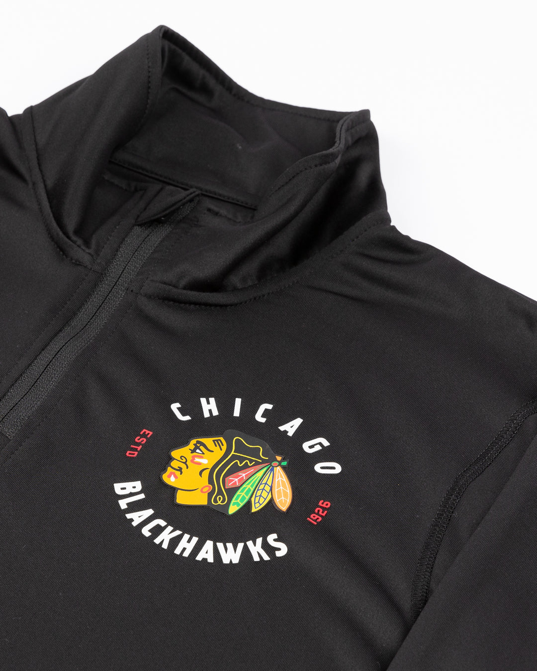 black CCM quarter zip with Chicago Blackhawks primary logo and wordmark on left chest and CCM logo on right chest - front detail lay flat