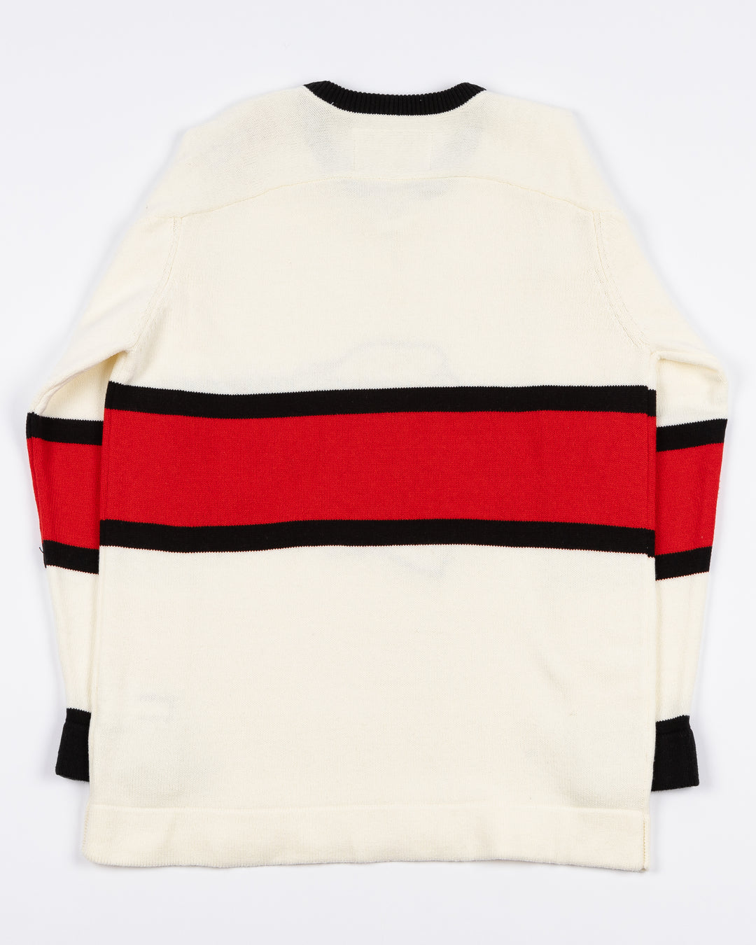 white CCM sweater with red and black stripe on center with Chicago Blackhawks primary logo across front with lace neck details - back lay flat