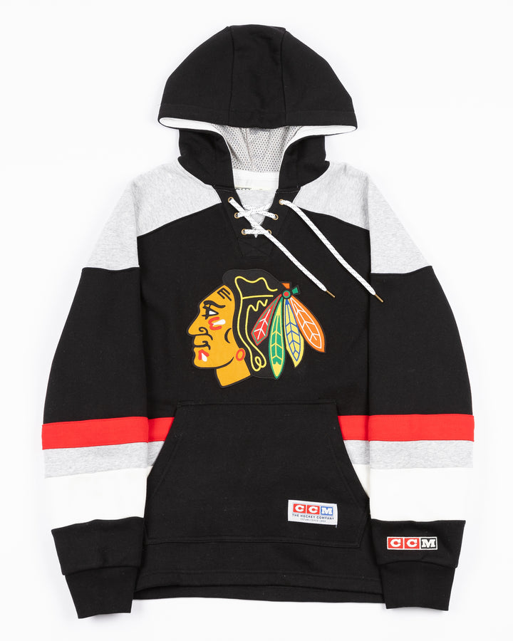 black, red, grey and white CCM jersey-inspired hoodie with Chicago Blackhawks primary logo on front - front lay flat