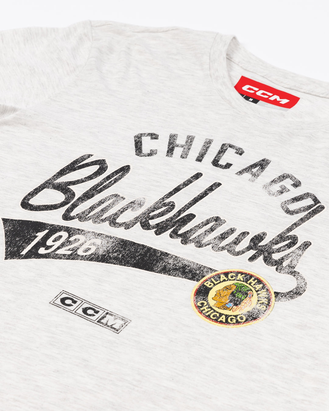 heather grey CCM short sleeve tee with vintage inspired Chicago Blackhawks wordmark and logo across front - front detail lay flat