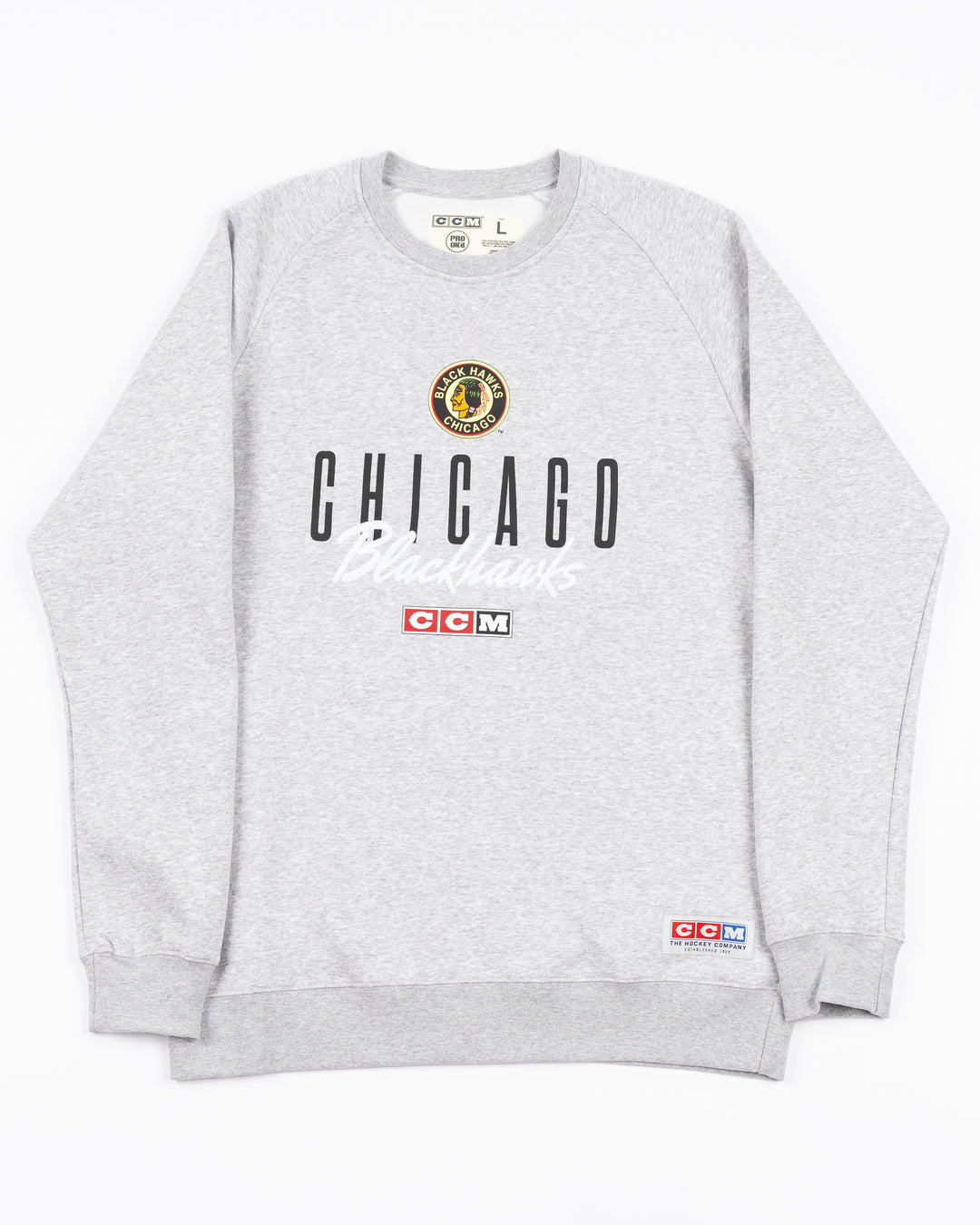 grey CCM crewneck with vintage Chicago Blackhawks logo and wordmark across the front - front lay flat