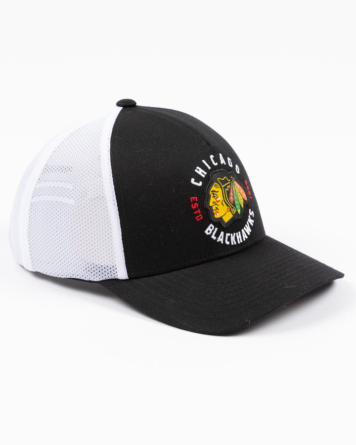 black and white CCM trucker cap with Chicago Blackhawks primary logo and wordmark on front - right angle lay flat