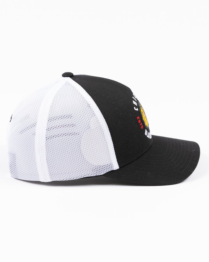 black and white CCM trucker cap with Chicago Blackhawks primary logo and wordmark on front - right side lay flat