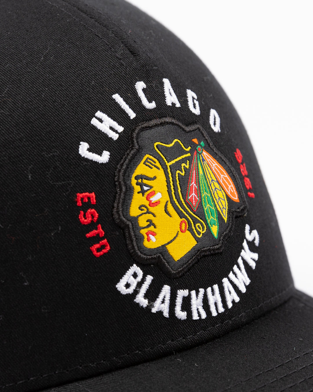 black and white CCM trucker cap with Chicago Blackhawks primary logo and wordmark on front - front detail lay flat