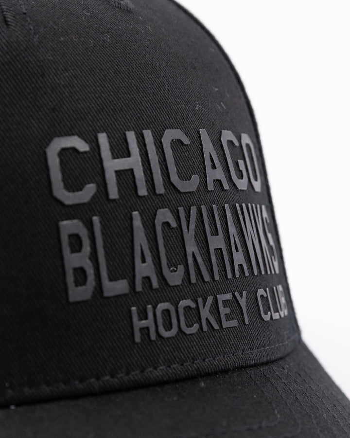 black CCM adjustable hat with Chicago Blackhawks Hockey Club tonal wordmark on front - front detail lay flat